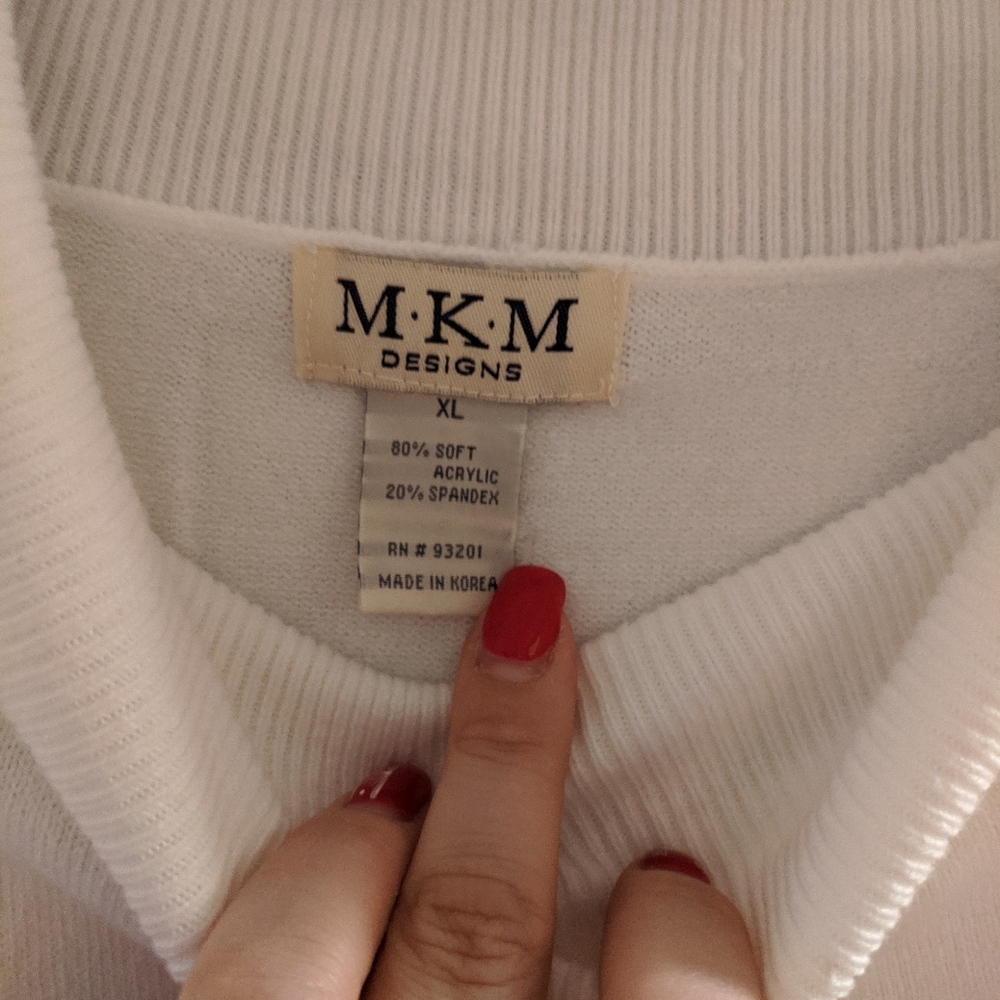 White vowel neck sweater
